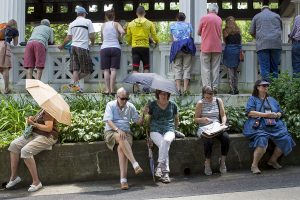 Audience members find alternative spots to listen as journalist Bill Moyers gave the afternoon lecture titled "The Soul of Democracy" on Friday, July 8, 2016, at the Hall of Philosophy. Photo by Mike Clark.