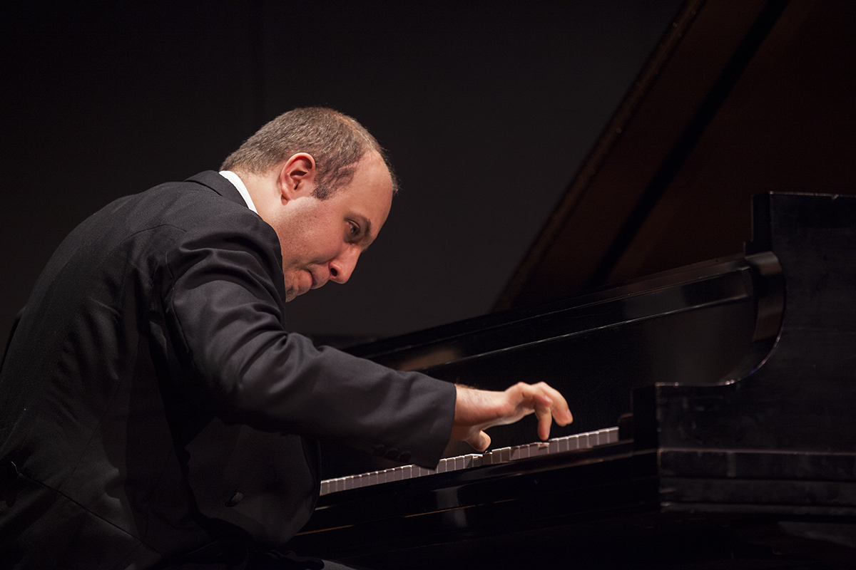 Pianist Alexander Gavrylyuk performs Prokofiev's "Piano Sonata No. 3 in A minor, op. 28" in a recital at 8:15 PM on July 20, 2016, in the Amphitheater. Although this was a solo recital, Gavrylyuk will also perform with the Chautauqua Symphony Orchestra at 8:15 PM on July 23, 2016, in the Amphitheater. Photo by Carolyn Brown.