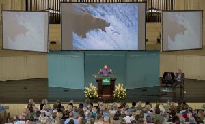 Photographer and National Geographic contributor Joel Sartre delivers the morning lecture Monday, July 25, 2016, in the Amphitheater. Photo by: Mike Clark