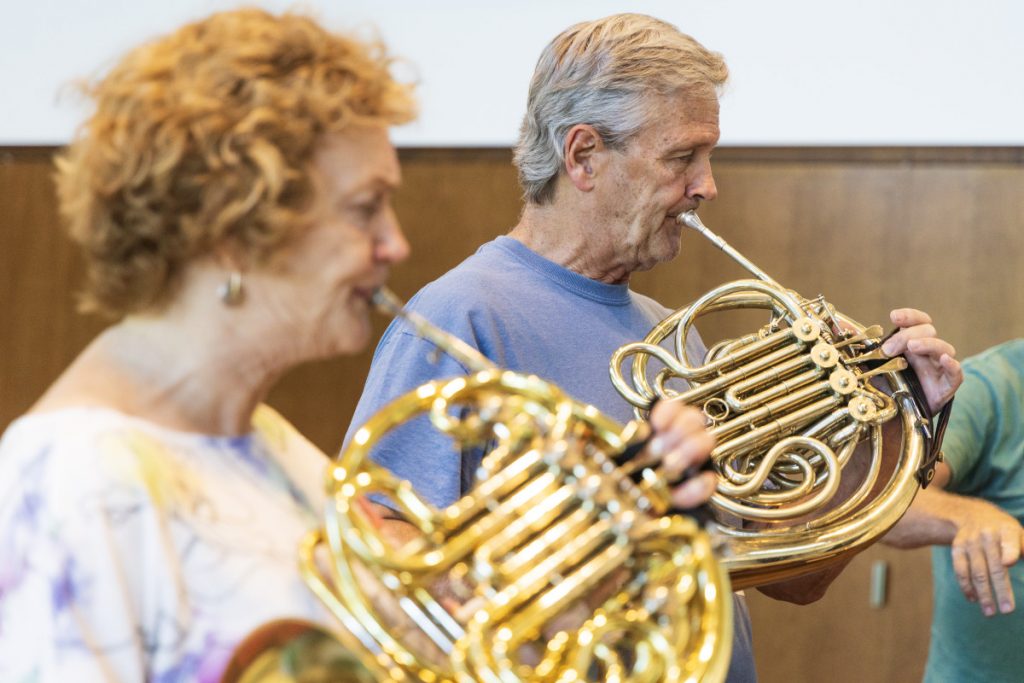 Chautauqua Symphony Orchestra French horn players Donna Dolson and William Bernatis rehearse Monday in the Amp.