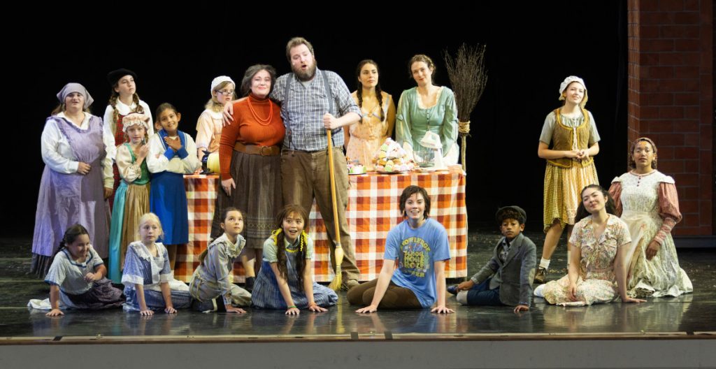 The Chautauqua Opera Company cast, with the production’s children’s chorus, rehearse Saturday in the Amphitheater.