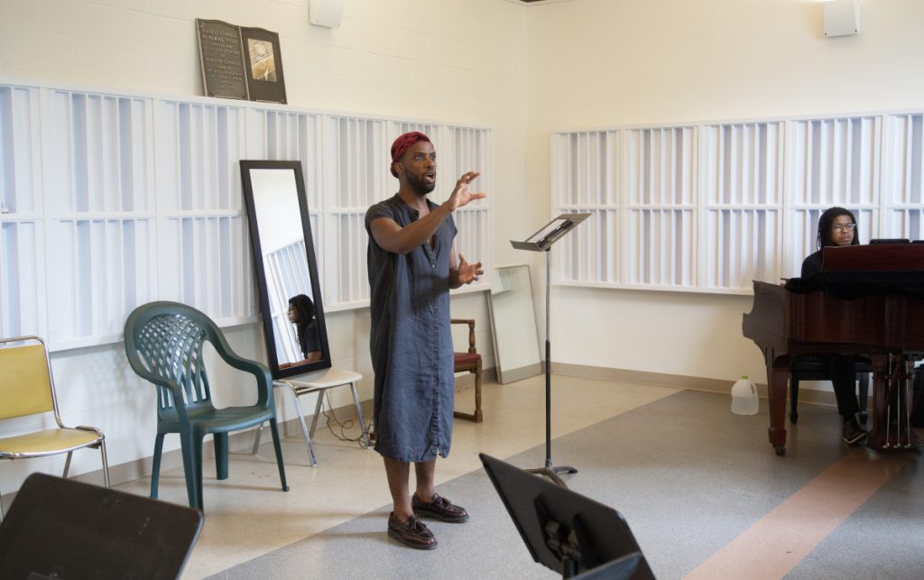 Wayne Arthur, baritone, sings a powerful piece focusing on social justice and experience of the after-effects of the Black diaspora Tuesday, July 8, 2025 near McKnight Hall.