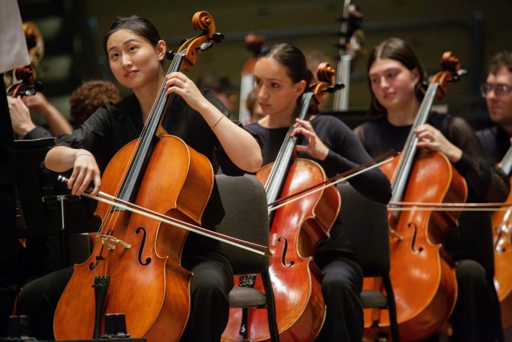 Lekai Li plays the cello along to Mozart’s Symphony No. 31 on Monday, June 30, 2025 in the Amphitheater.