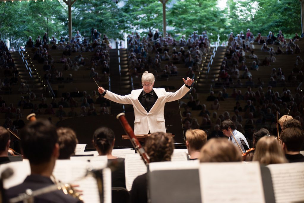 Music School Festival Orchestra Artistic Director Timothy Muffitt conducts during the Music School Festival Orchestra performance July 7, 2025 in the Amphitheater.