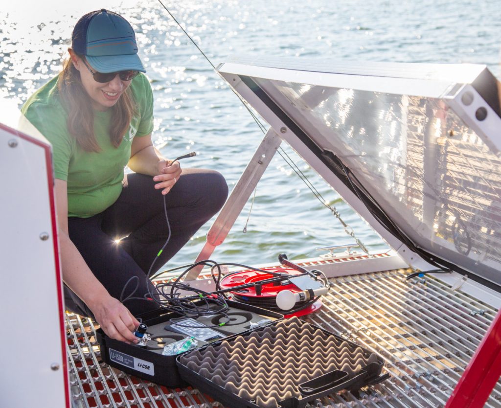 Hyrcik steps on to one of The Jefferson Project’s vertical profilers and measures the depth of the water, using a method that dates back to the 1800s.